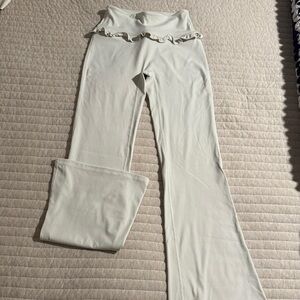 Cream Boot-Cut Ruffle-Waist Pants